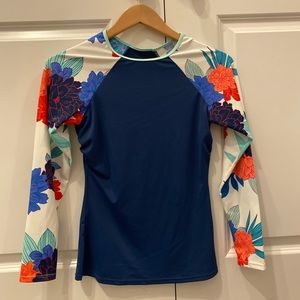 Navy blue and floral rash guard